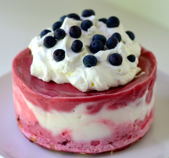red, white, and blue sorbet with whipped cream and fresh fruit